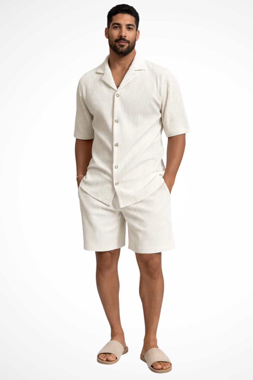 Full view of men's textured short sleeve shirt & shorts summer outfit. Stylish two-piece casual set.