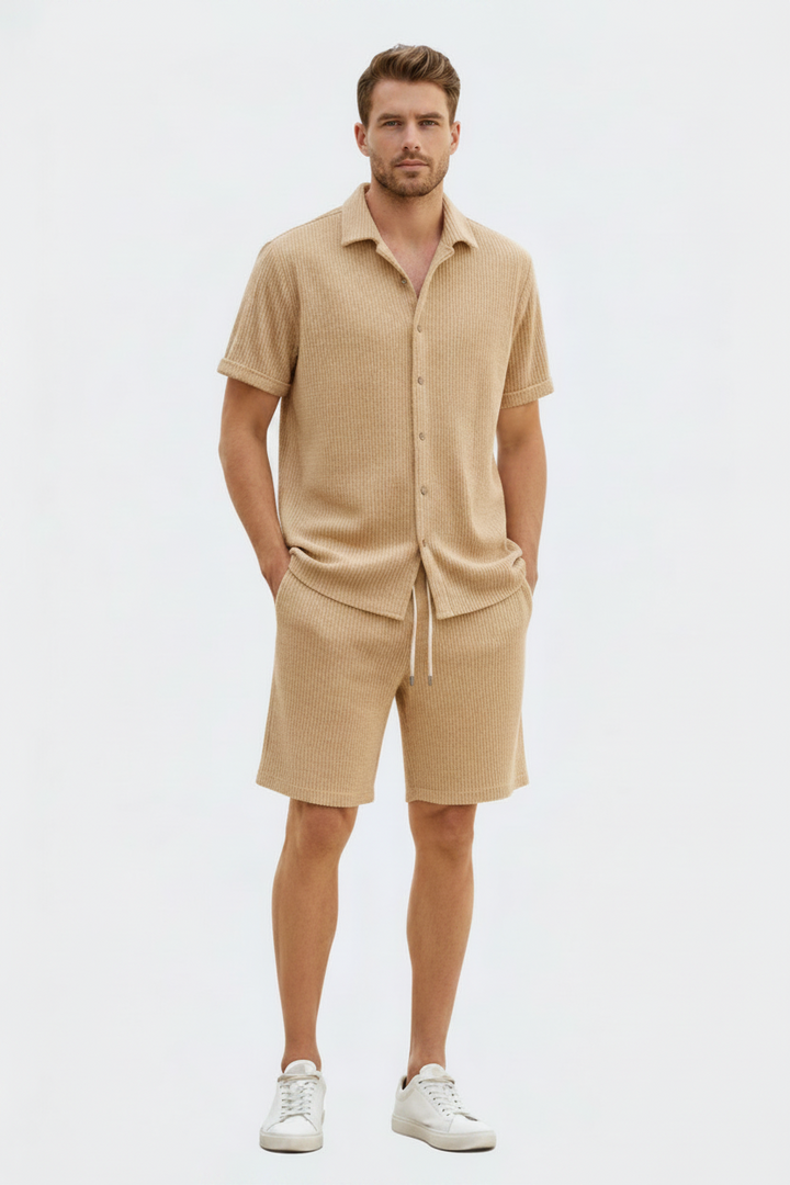 Stylish men's matching two-piece set featuring a textured summer shirt and comfortable shorts. Ideal casual wear.
