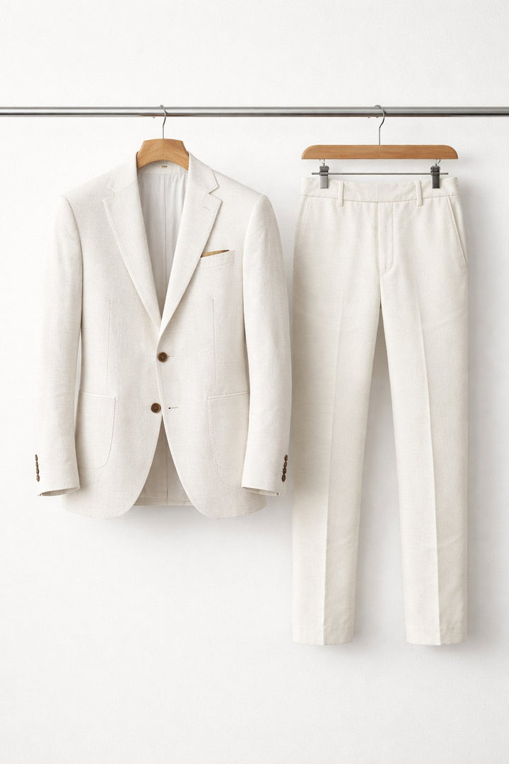 Modern men's textured two-piece suit. Structured blazer & tailored trousers for business & events.