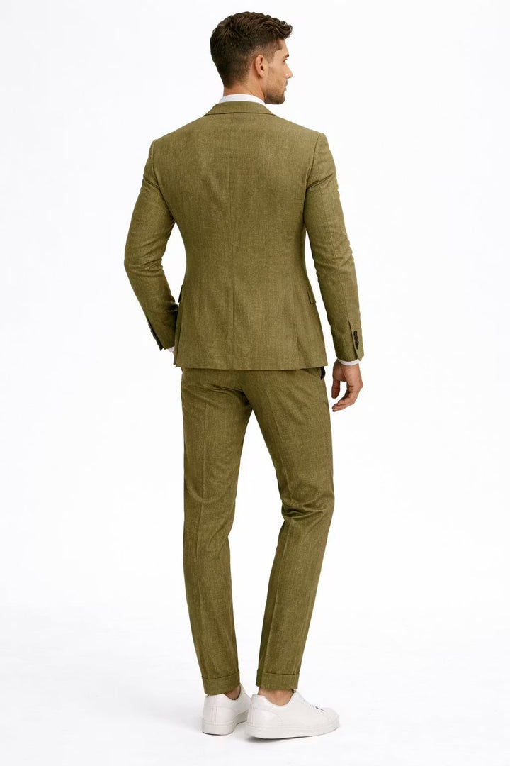 Structured men's blazer, part of a textured two-piece suit. Sophisticated men's fashion.