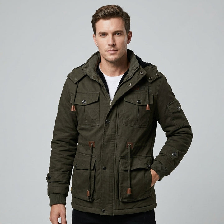 Men's cozy thermal hooded fleece jacket, perfect for cold weather. Offers warmth, comfort, and rugged outdoor style.