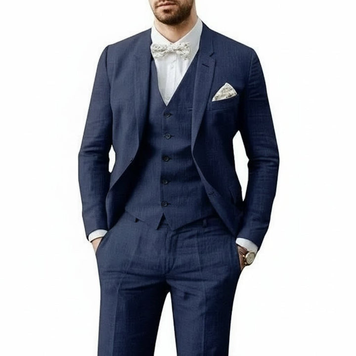 Elegant white three-piece men's suit, ideal for summer weddings, formal events, & groom.