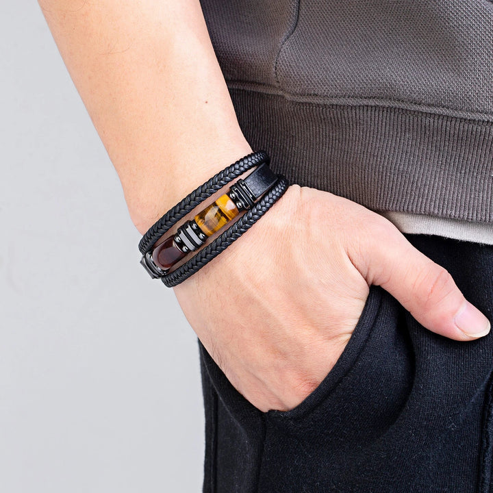 Fashionable men's wristwear: multilayer tiger eye bracelet, combining natural stones with a modern braided style.