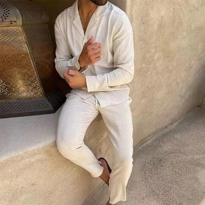 Comfortable men's two-piece long sleeve shirt and trouser set in a stylish, breathable fabric for casual wear.