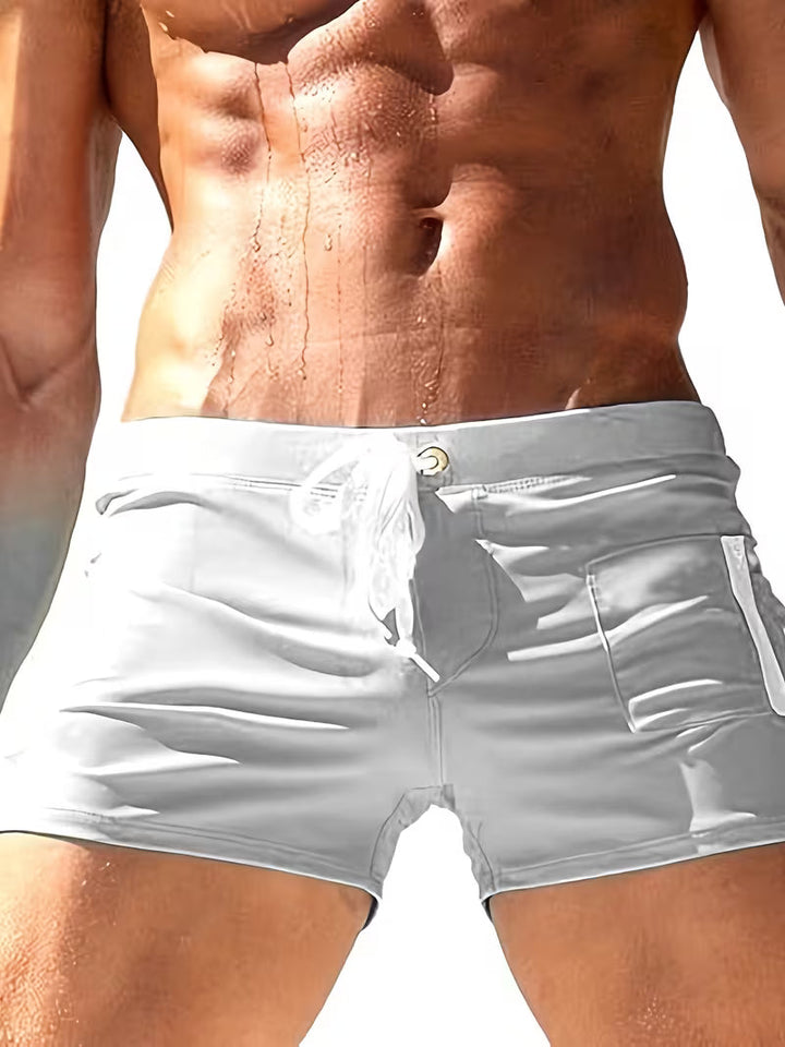 Men's vacation-ready boxer swim trunks, quick-dry fabric for ultimate beach and pool comfort.