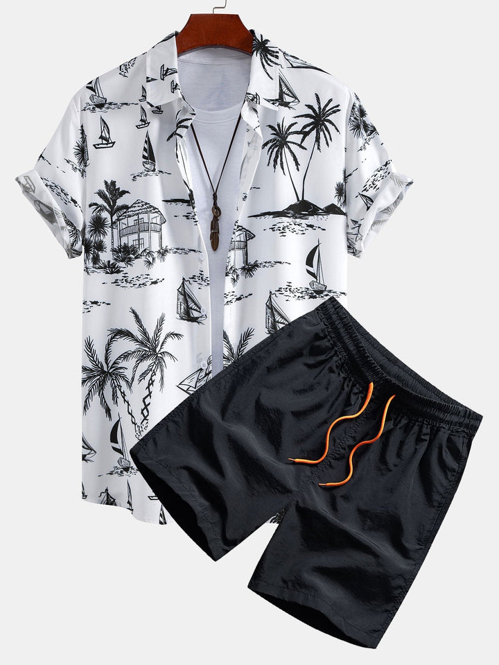 Stylish men's palm print short-sleeve shirt and coordinating swim shorts for a casual summer look.