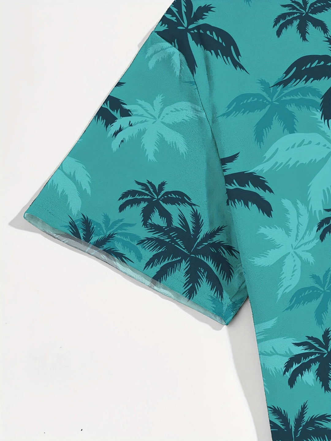 Casual men's short-sleeve palm tree print shirt, comfortable and stylish for summer outings and resort fashion.