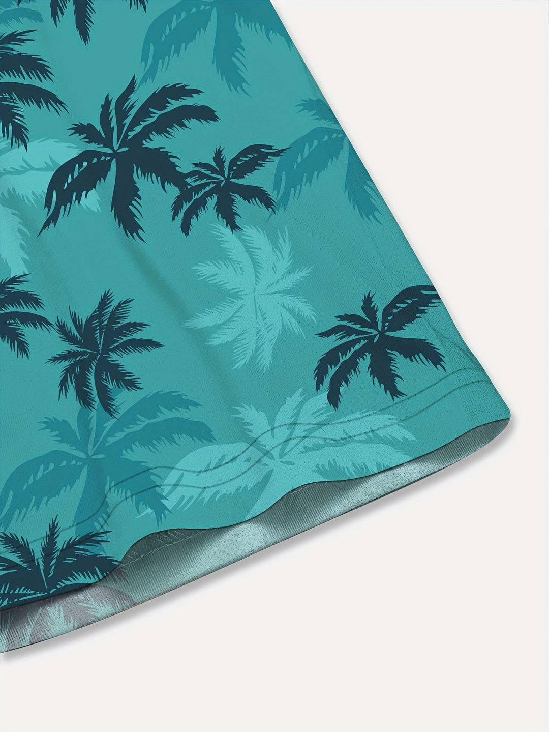 Vibrant men's tropical palm tree print short-sleeve shirt, a must-have for summer fashion and beach days.