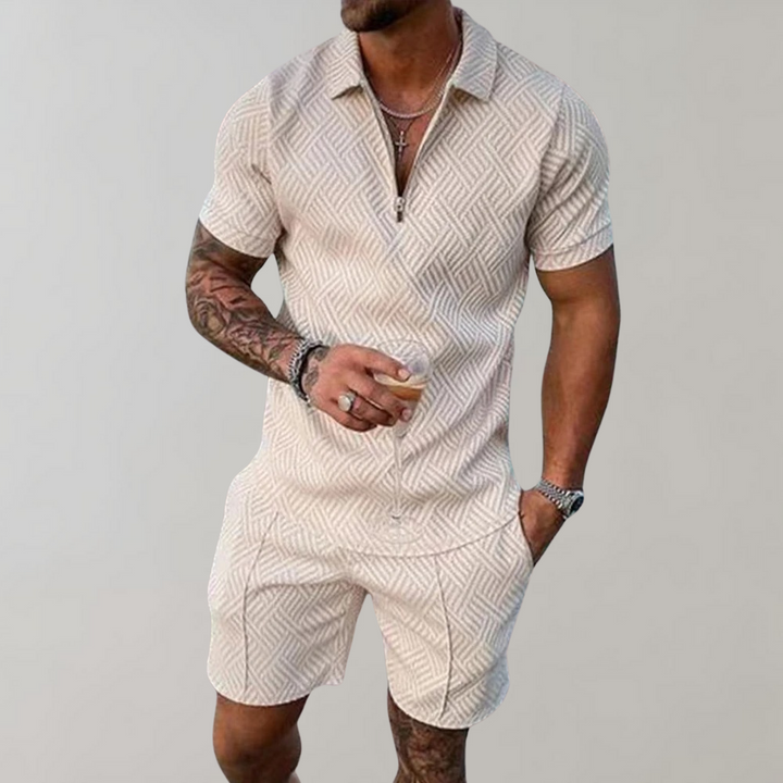 Man wearing a stylish two-piece summer set: polo shirt & shorts. Comfortable casual wear for warm weather fashion.