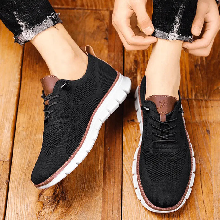 Breathable men's athletic sneakers, designed for ultimate comfort & airflow during casual wear.