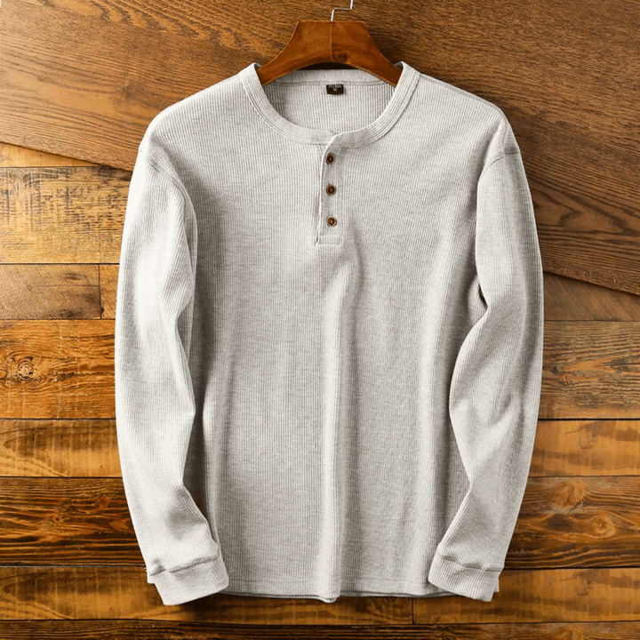 Men's ultra-soft long sleeve Henley shirt for effortless style and all-day comfort.