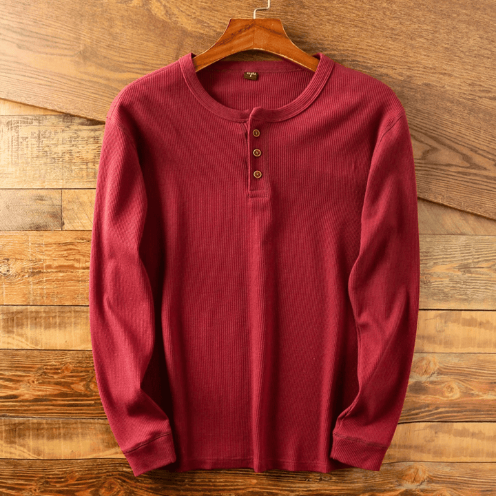 Stylish men's soft Henley button shirt, perfect for versatile everyday casual wear.