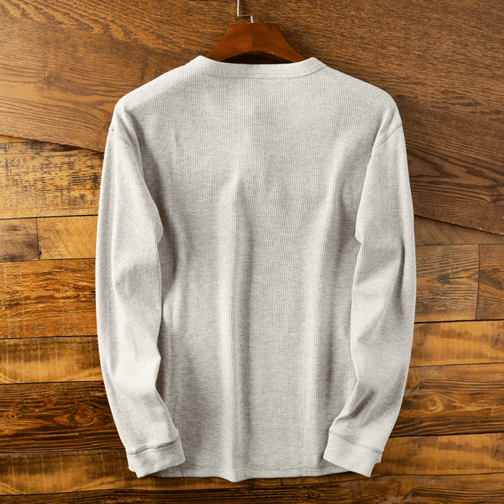 Classic men's Henley shirt with buttons, designed for ultimate comfort and casual style.