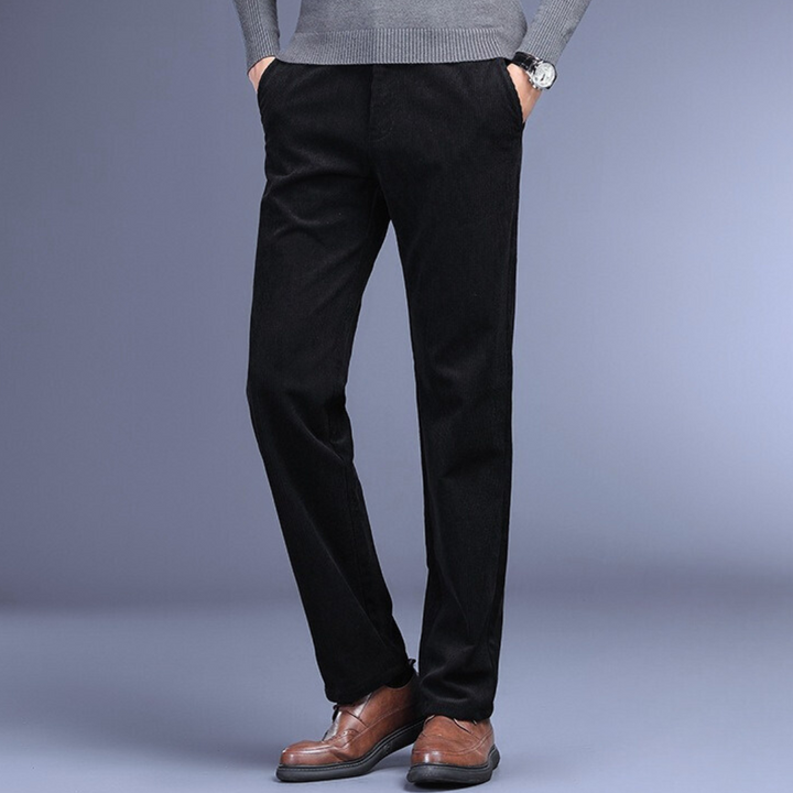 Man wearing versatile men's stretch trousers, showcasing comfortable fit and stylish appeal for any occasion.