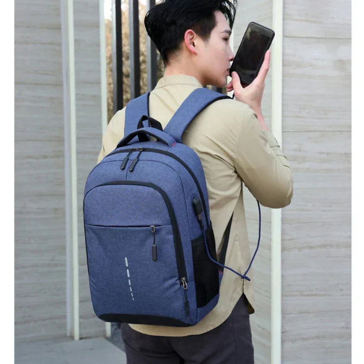 Durable men's ultralight travel day pack, back view. Ergonomic straps ensure comfort for hikes & long wear.