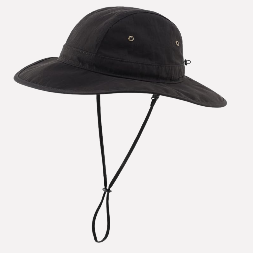 Stylish men's bucket sun hat with wide brim & UPF 50+, ideal for beach, travel, and outdoor wear.