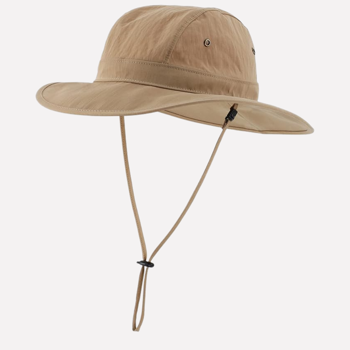 Adjustable men's UPF 50+ sun hat with wide brim, designed for comfort during hiking & adventures.