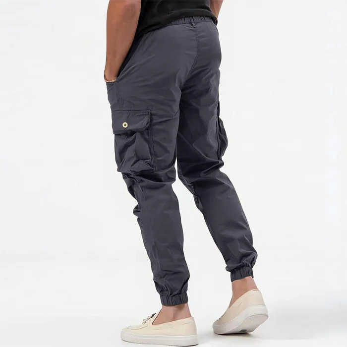 Stylish men's cargo joggers, perfect for urban activewear & casual streetwear, with practical utility pockets.