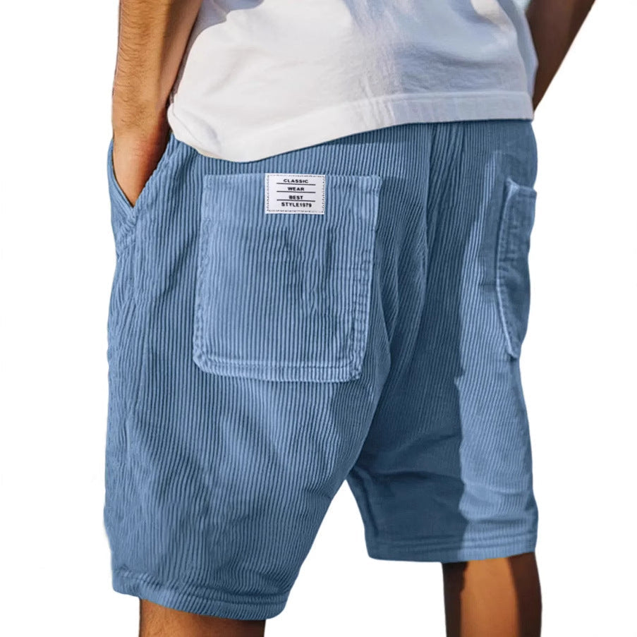Comfortable men's urban casual shorts with elastic waistband, perfect for relaxed summer and streetwear.