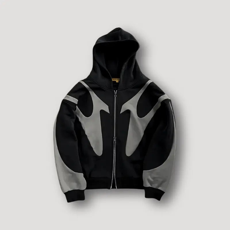 Stylish men's zip-up hoodie featuring unique urban patchwork, ideal for streetwear fashion.