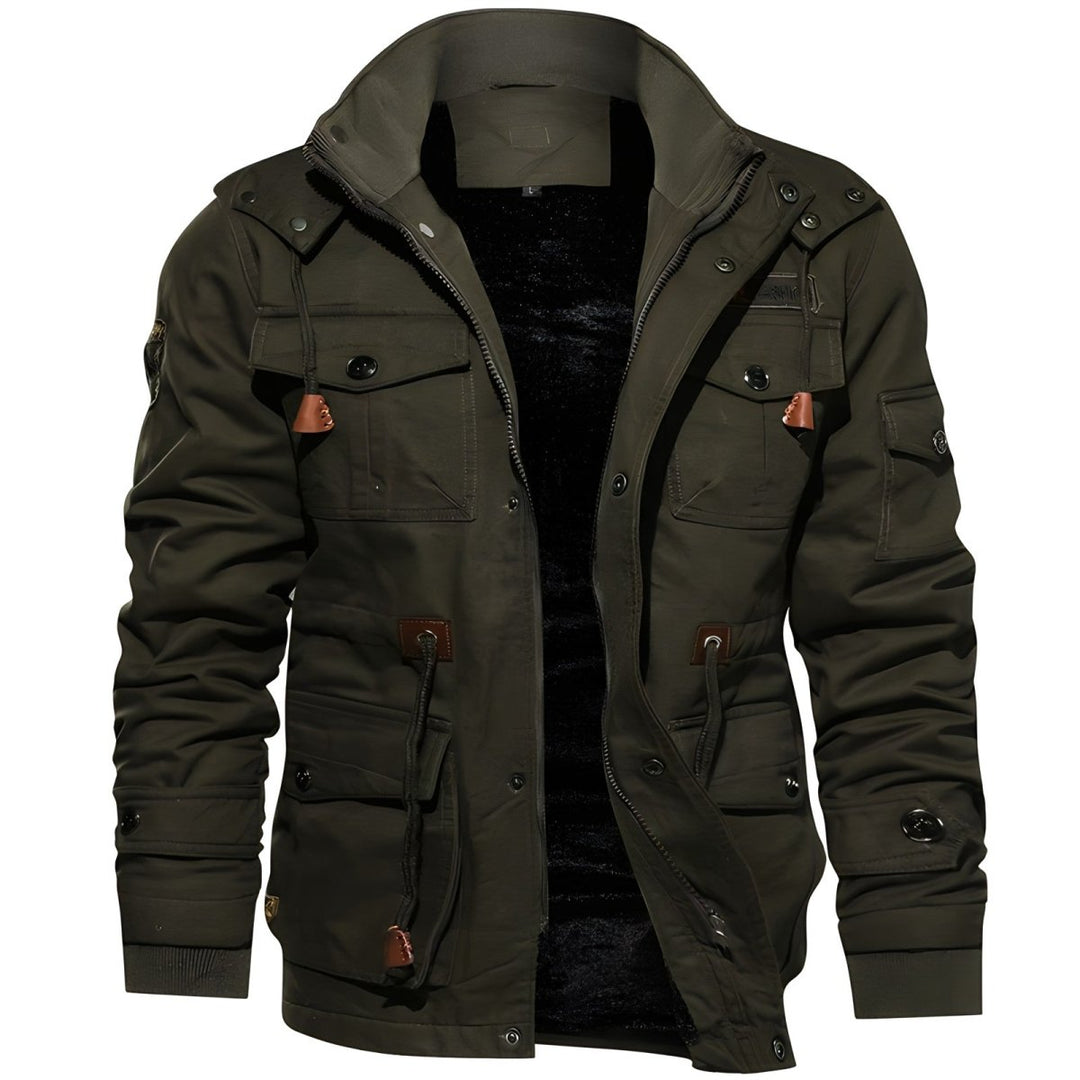 Model wearing a men's multi-pocket hooded jacket, demonstrating its urban style and comfortable fit.