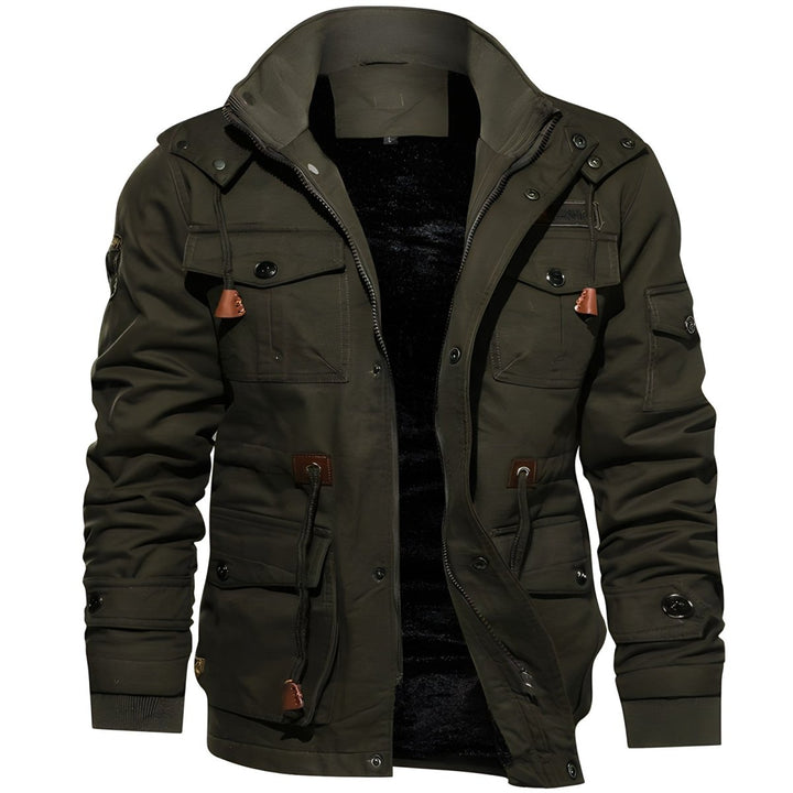 Model wearing a men's multi-pocket hooded jacket, demonstrating its urban style and comfortable fit.