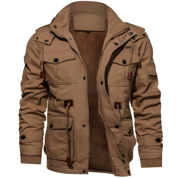 Detail of the adjustable hood and secure zip closure on a men's versatile utility jacket.