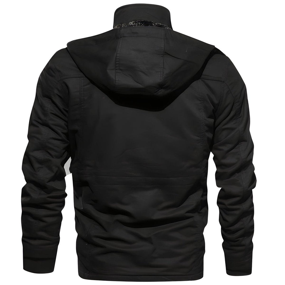 Close-up of the multi-pocket detail on a men's hooded utility jacket, emphasizing functionality.