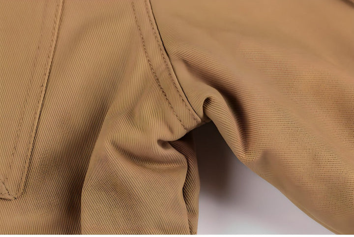 Back view of the men's urban hooded jacket, showcasing its clean lines and durable construction.