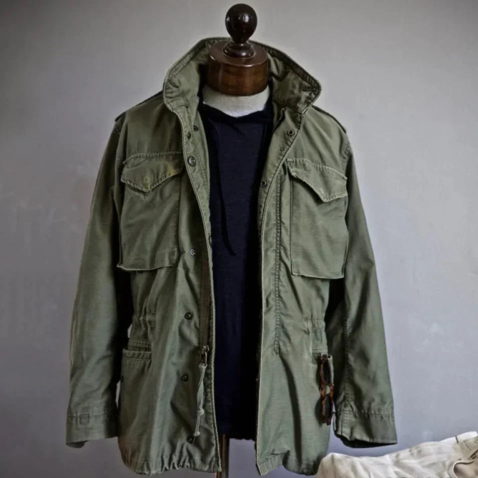 Men's utility field jacket with multi-pockets. Long sleeve military-style outerwear for casual adventures.