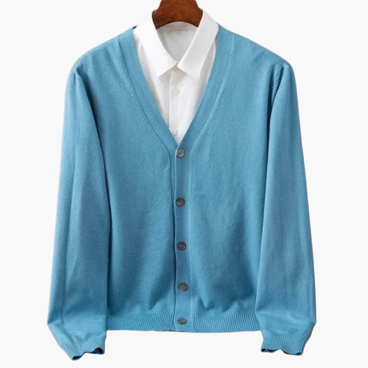 Stylish men's V-neck button-front knit cardigan. Perfect for layering, adds a classic touch to casual menswear.