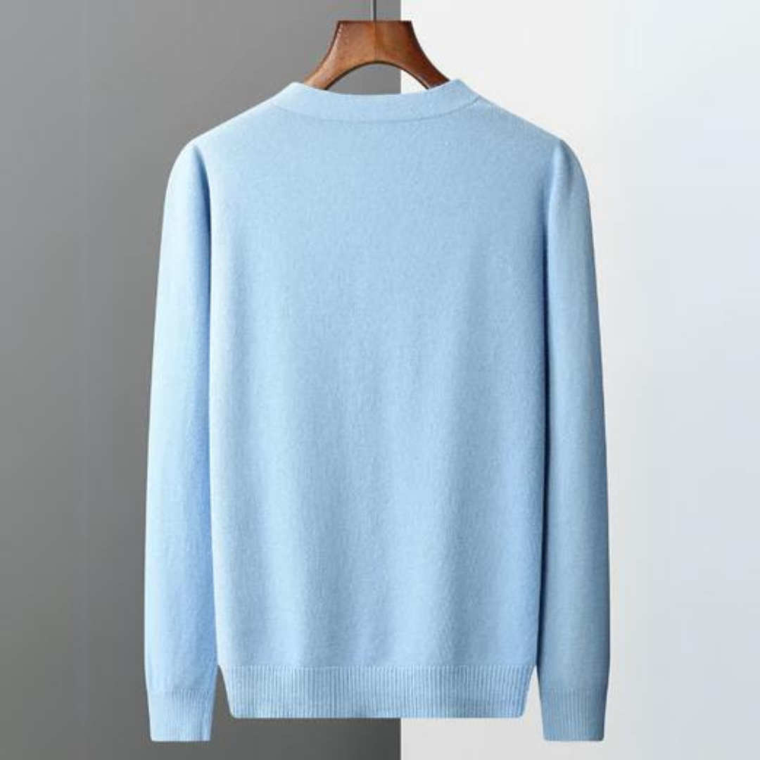 Essential men's V-neck cardigan. Button-front design, long-sleeve comfort for cooler fall and winter days.
