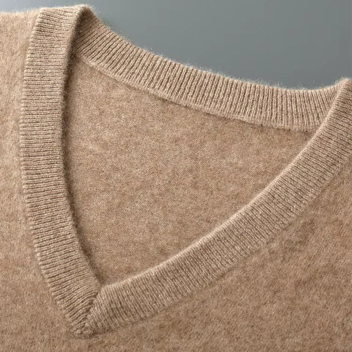 Men's V-neck sweater vest, offering classic layering, cozy comfort, and smart casual style for men.