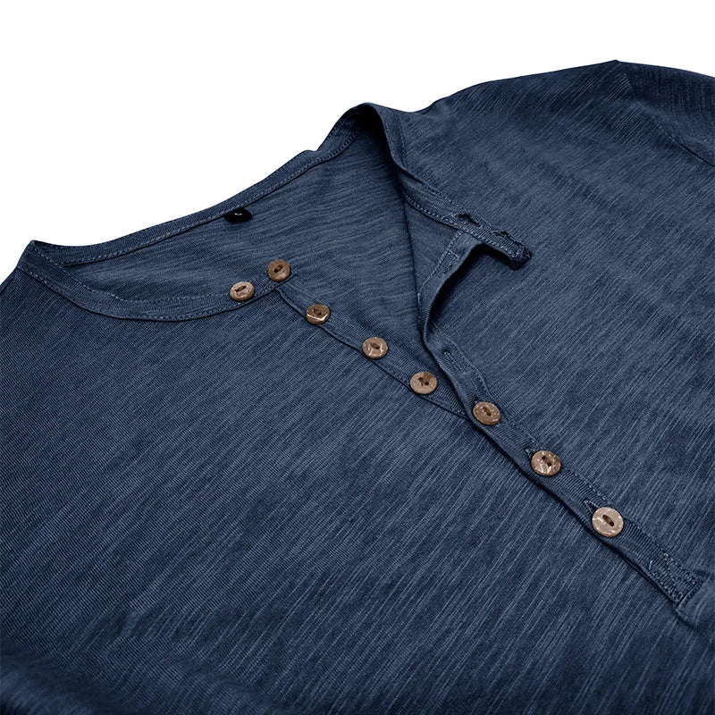 Long-sleeve men's henley shirt with 7-button placket. Comfortable & versatile for men's fashion everyday wear.