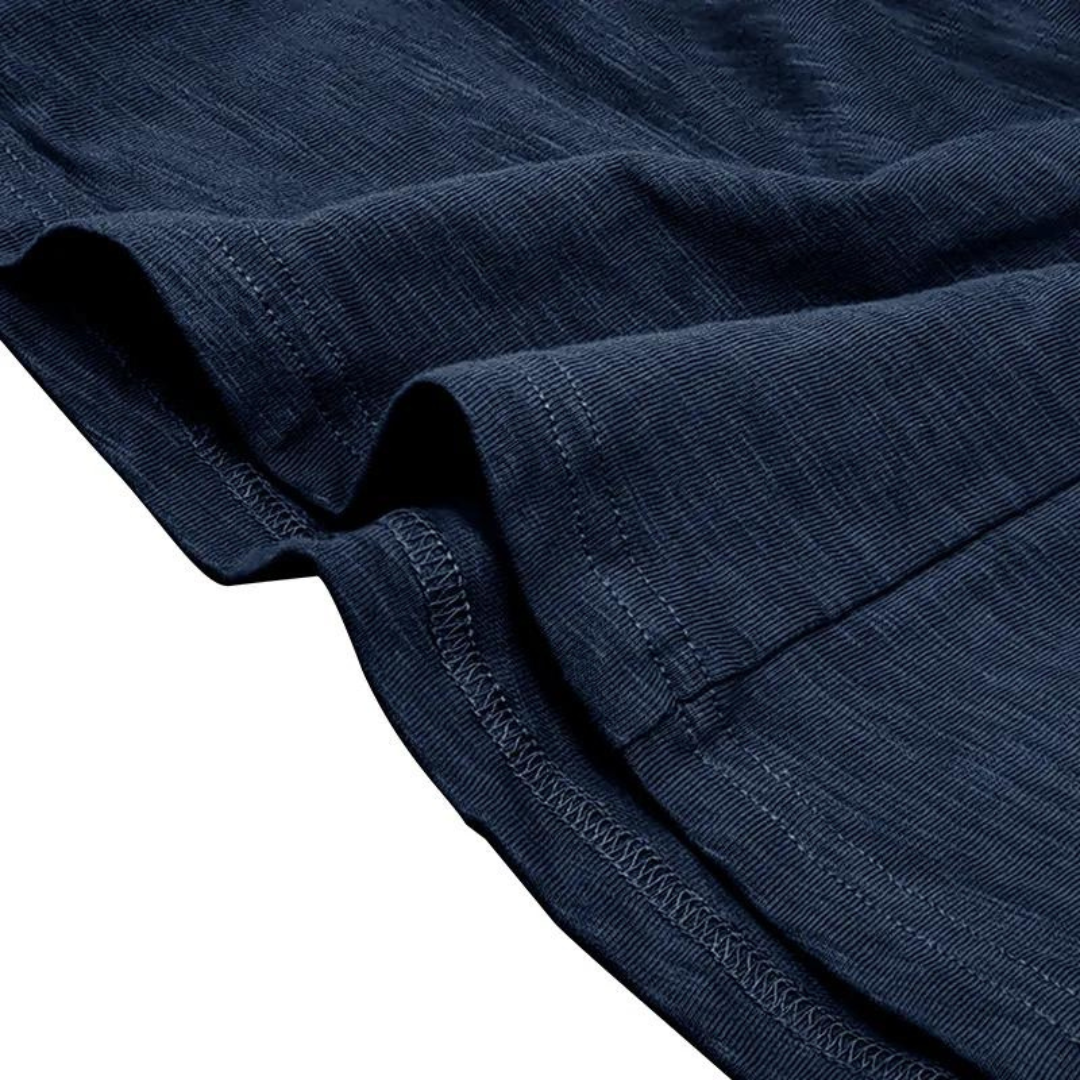 Men's henley neckline shirt, 7-button placket & long sleeves. Ideal for casual and smart-casual versatile looks.