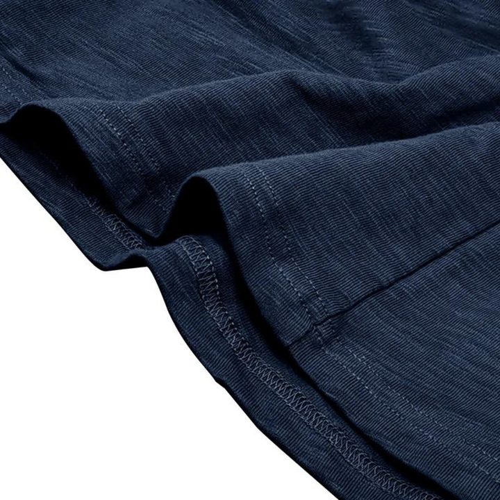 Men's henley neckline shirt, 7-button placket & long sleeves. Ideal for casual and smart-casual versatile looks.