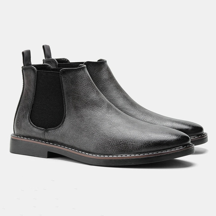 Modern men's ankle boots with durable construction & sleek design, perfect for contemporary men's footwear.