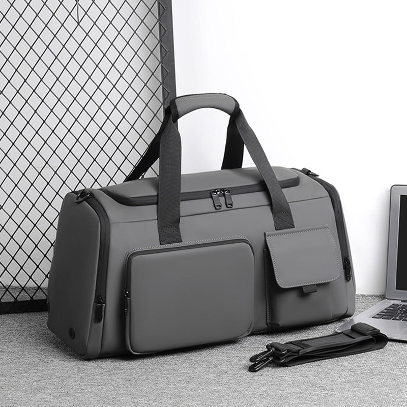 Men's versatile black duffel bag for gym, sports, and weekend travel. Durable & water-repellent with organized pockets.