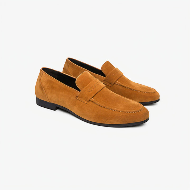 Classic men's penny loafers in black leather, ideal comfortable footwear for office and formal occasions.