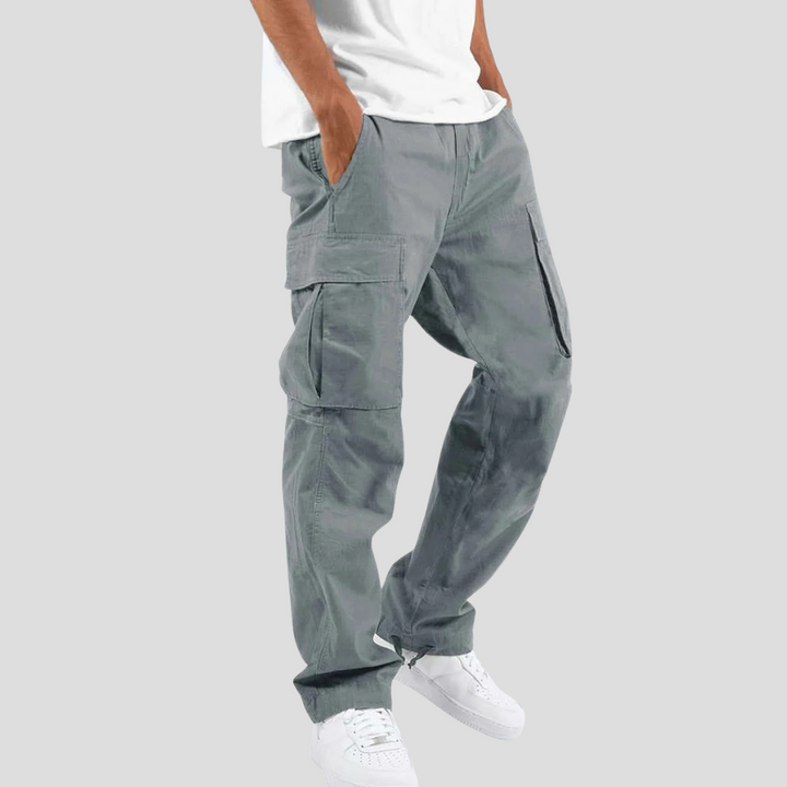 Utility men's cargo pants perfect for outdoor wear, with durable fabric, adjustable waist, and ample pockets.