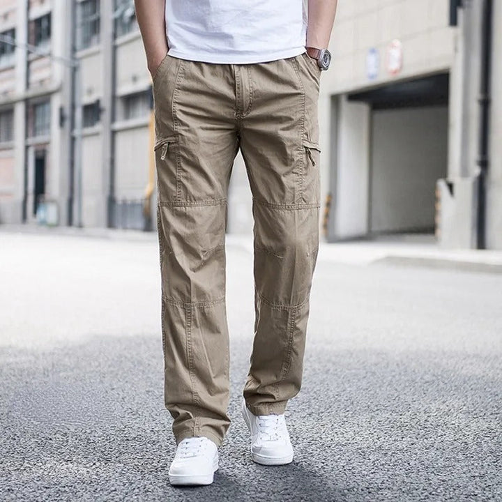 Men's versatile cargo pants, relaxed fit, multi-pocket design for everyday comfort & modern style.