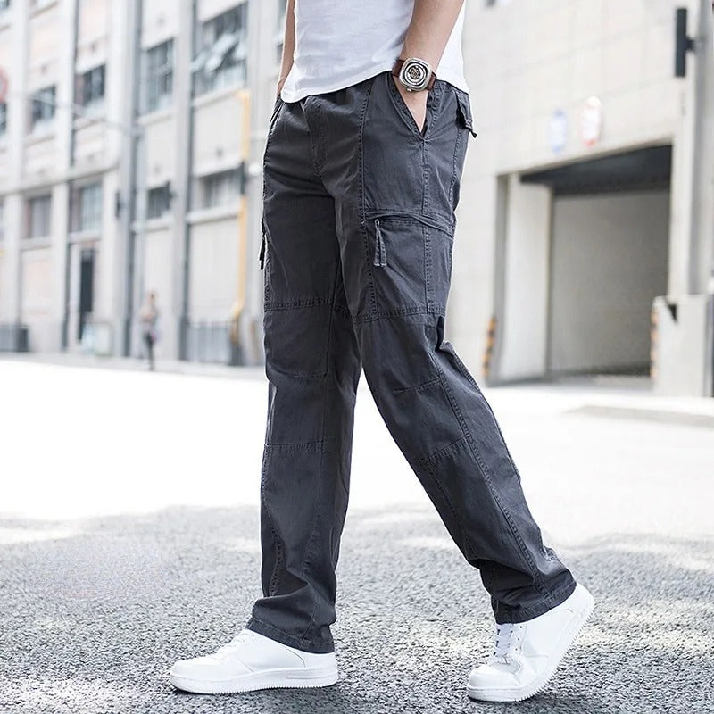 Close-up of multi-pocket men's cargo pants, showing utility & modern style for everyday wear.