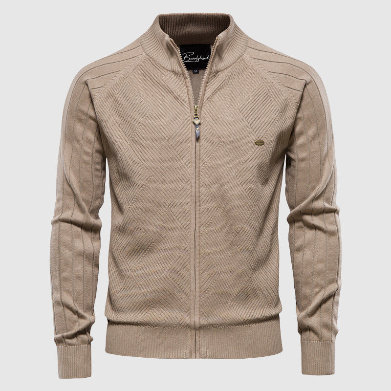 Close-up of a versatile men's full-zip cardigan, highlighting comfortable fabric. A stylish long sleeve sweater for casual layering.
