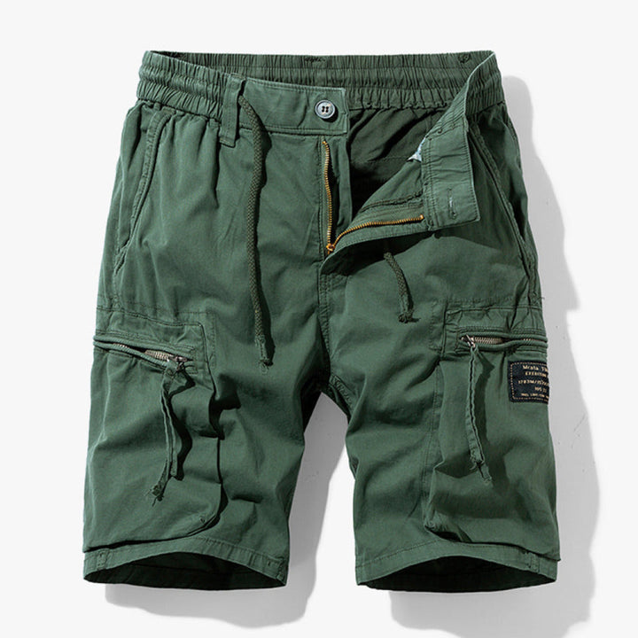 Army green men's cargo shorts for hiking & casual summer adventures. Comfortable, durable & stylish multi-pocket design.