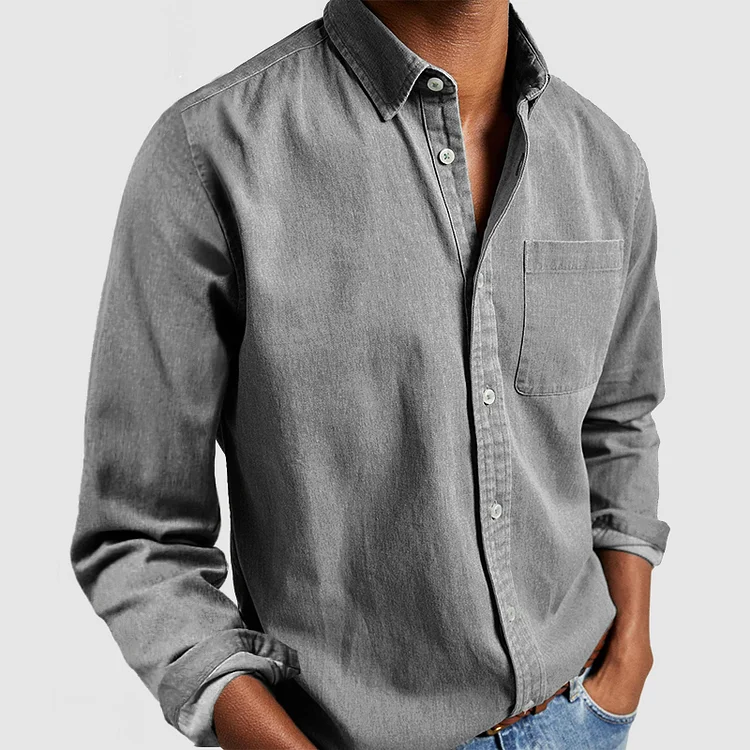 Stylish men's long sleeve button-up shirt featuring a single chest pocket, great for casual fashion.