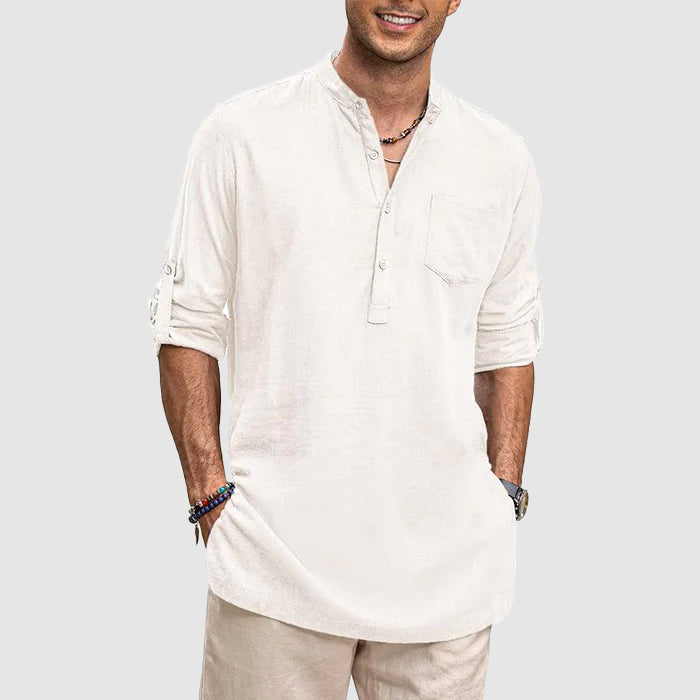Casual men's long-sleeve Henley shirt with button placket and roll-up tabs, great for everyday outfits.