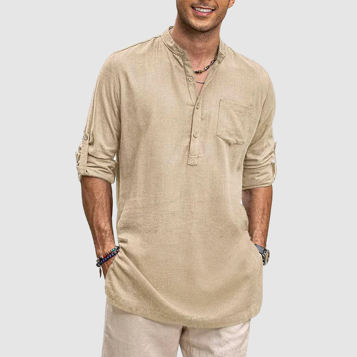 Men's casual Henley shirt, sleeves rolled up, showcasing versatile everyday fashion.