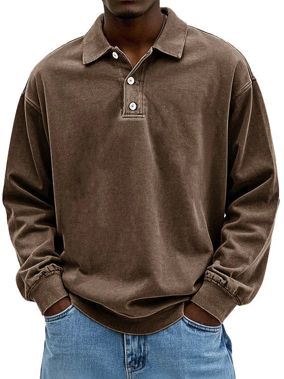 Refined men's apparel: comfortable long sleeve polo shirt with a stylish button-down design.