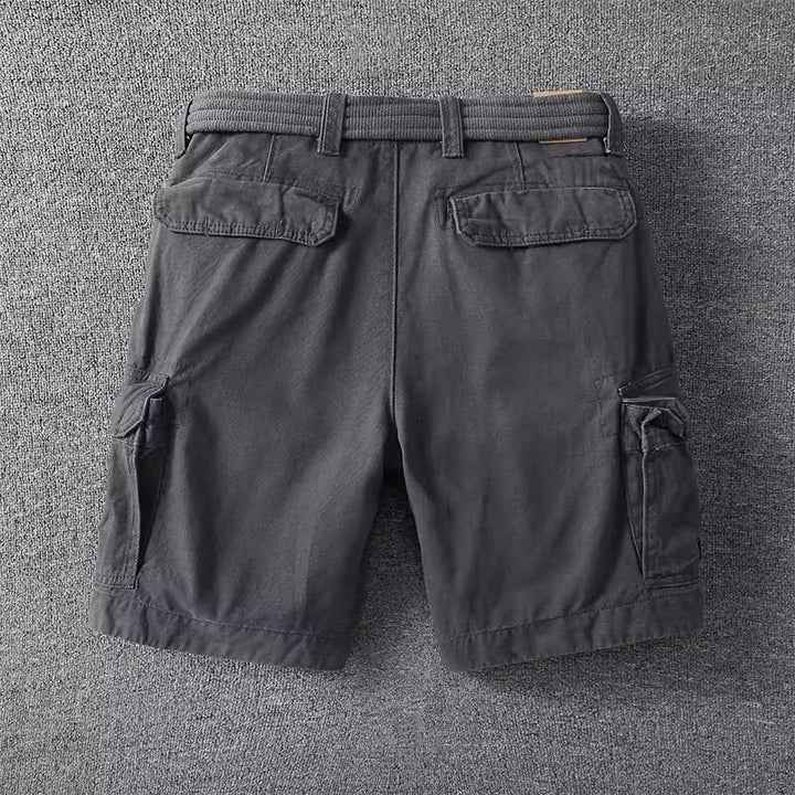 Close-up of men's straight leg cargo shorts pocket detail, highlighting durable fabric & versatile design.
