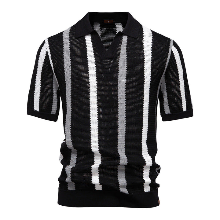 Close-up of men's polo with subtle vertical stripes & modern open collar, offering a relaxed yet refined summer style.
